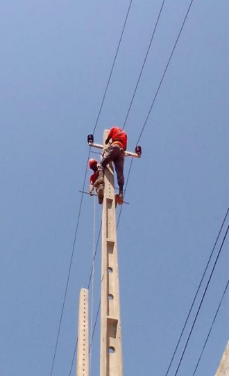 Trabalho em poste de energia